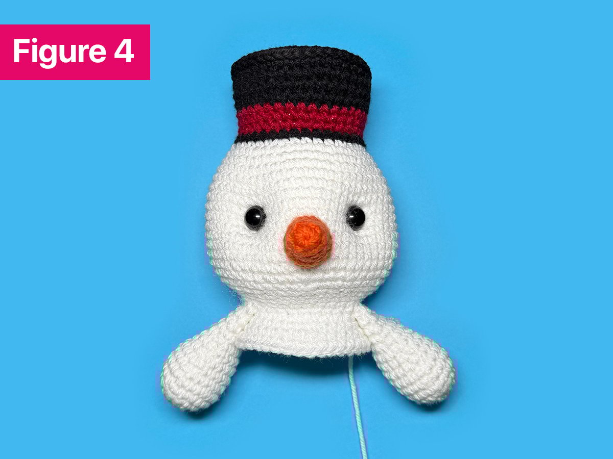 How to Crochet a Snowman Step 4: Adding the Safety Eyes